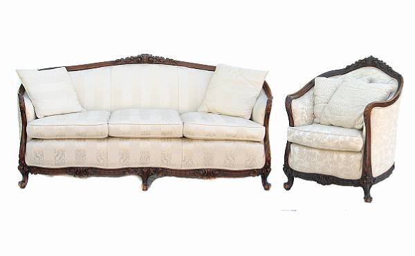 Appraisal: A Renaissance Revival parlor suite comprising a settee and an