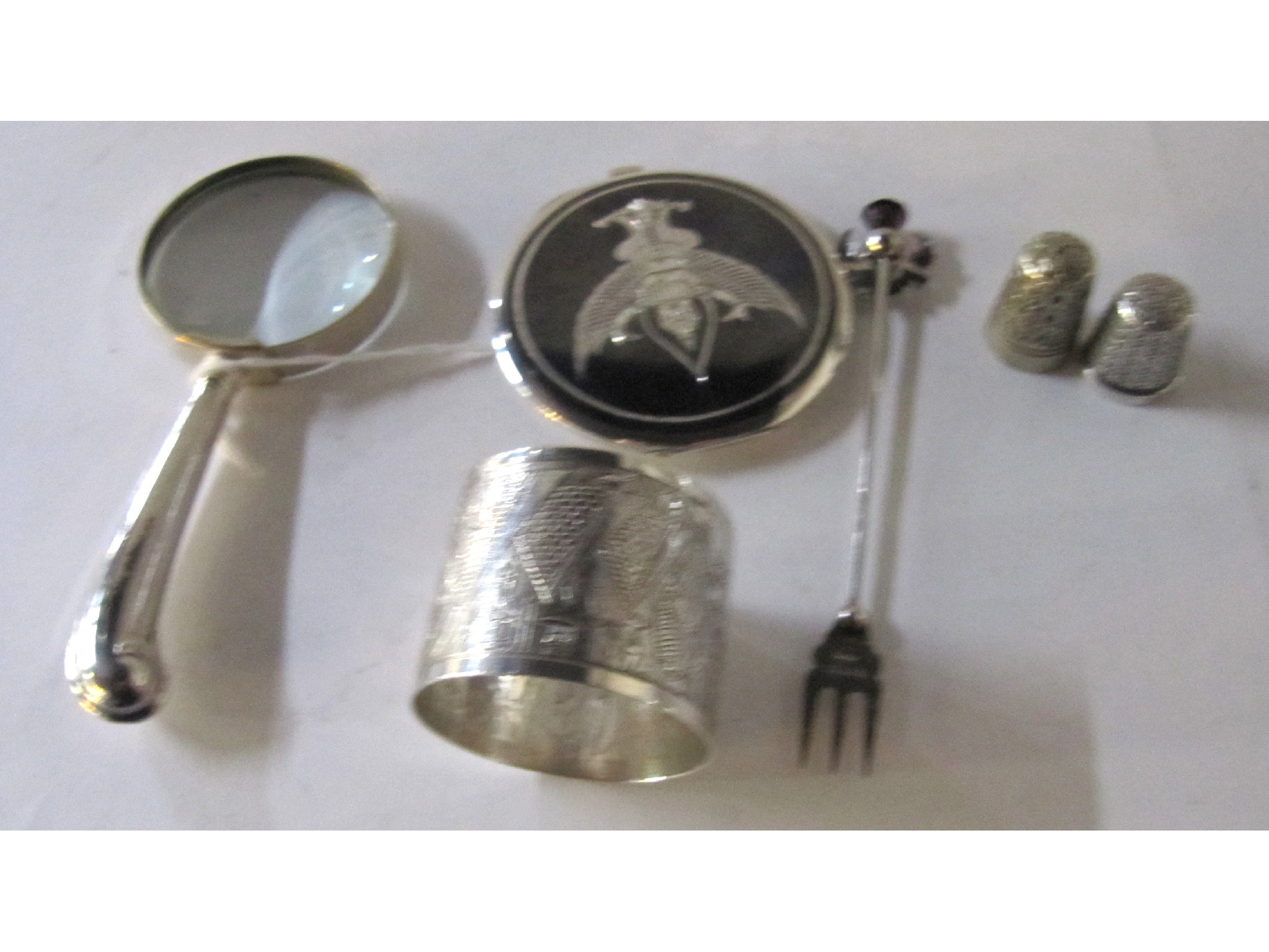 Appraisal: A lot comprising a silver and niello compact silver handled