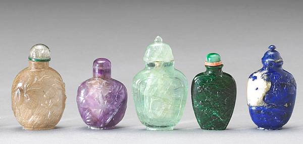 Appraisal: Five hardstone snuff bottles The first a malachite bottle carved