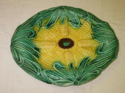 Appraisal: AN ENGLISH MAJOLICA DISH of oval form the yellow centre