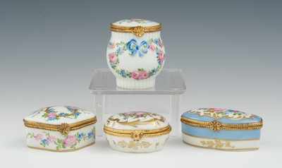 Appraisal: Four Porcelain Tabatieres Including oval shaped box with floral motif