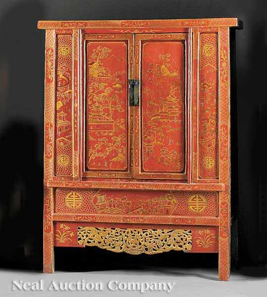 Appraisal: An Antique Chinese Red Lacquered Cabinet paneled doors over a