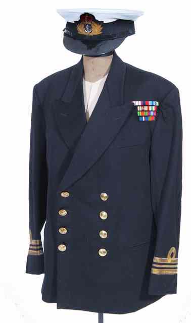 Appraisal: A LEUITENANT COMMANDERS NAVAL UNIFORM consisting of a jacket trousers