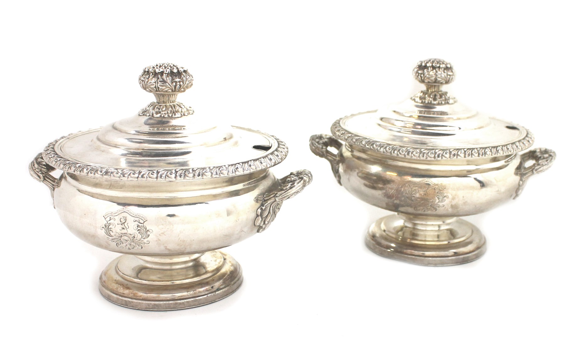 Appraisal: A pair of Sheffield plated twin handled sauce tureens and