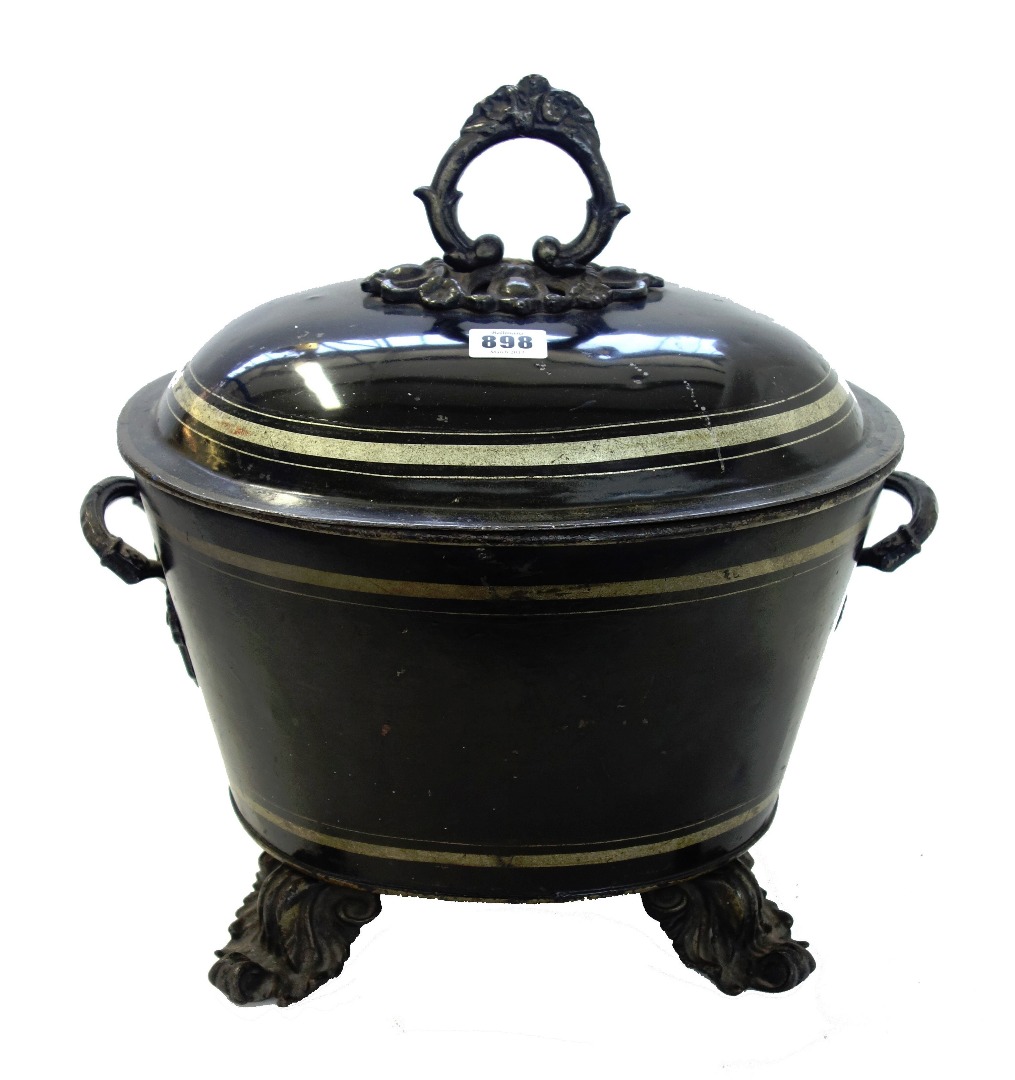 Appraisal: A Victorian ebonised metal oval coal bin and cover on