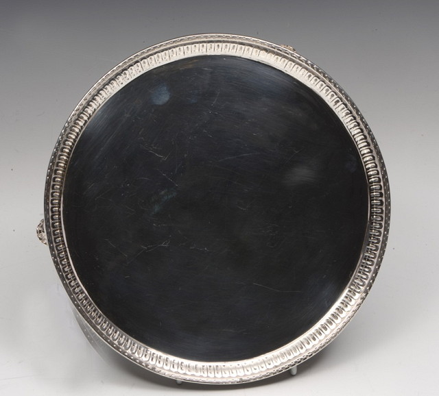 Appraisal: A GEORGE III SCOTTISH SILVER CIRCULAR SALVER with fluted edge