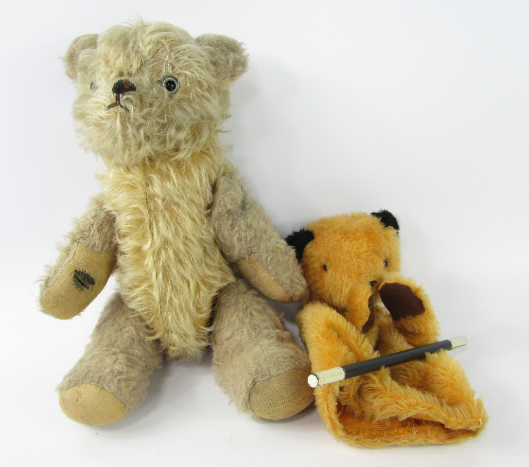 Appraisal: A mid thC teddy bear with golden mohair body and