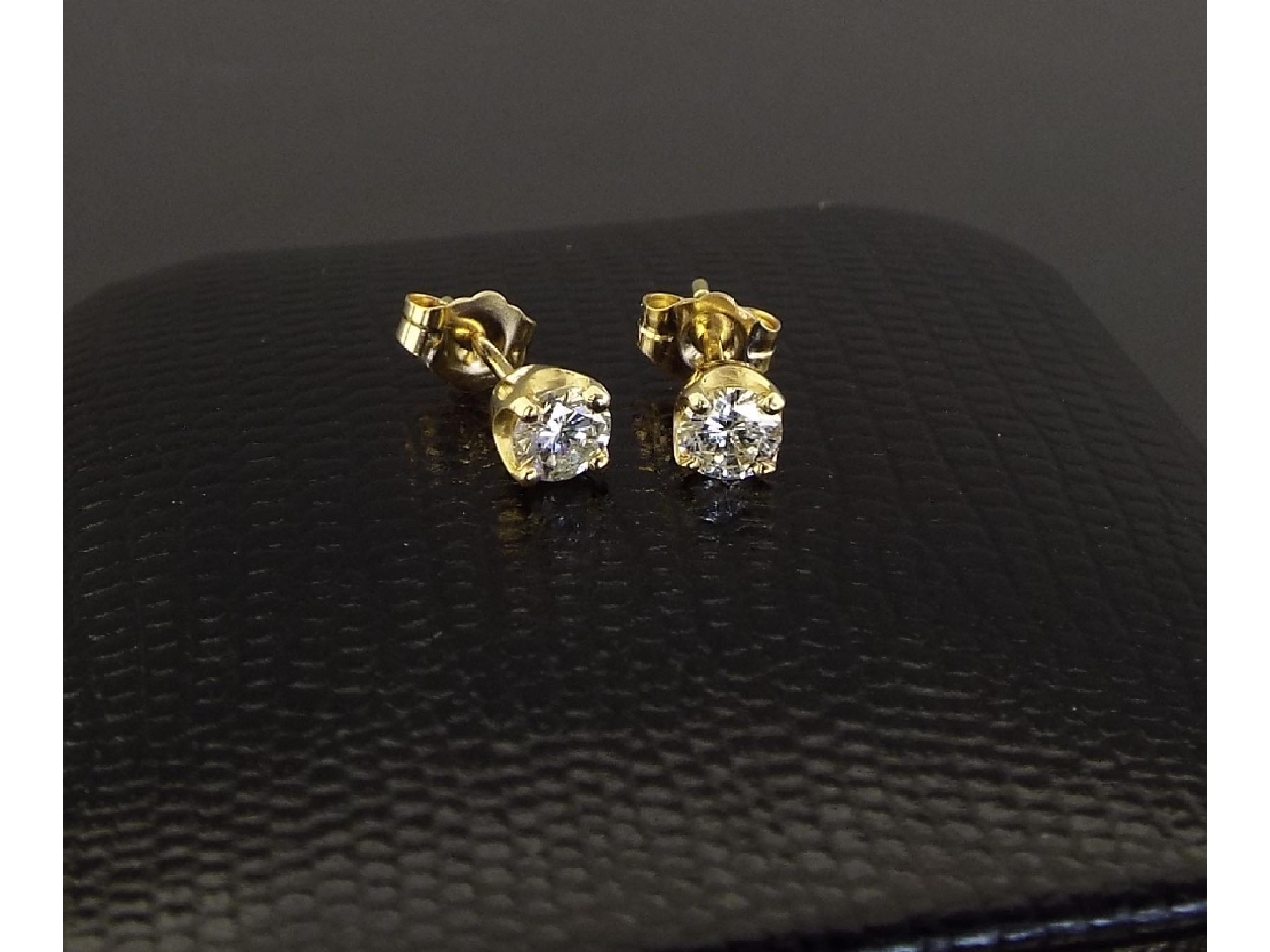 Appraisal: Pair of solitaire round brilliant cut diamond ear studs set