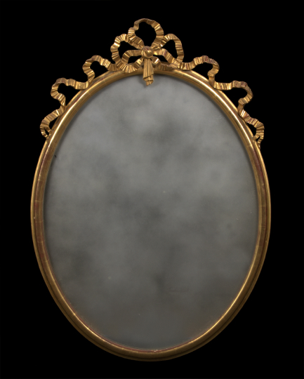 Appraisal: Louis XVI-Style Giltwood Looking Glass the ovoid molded frame with