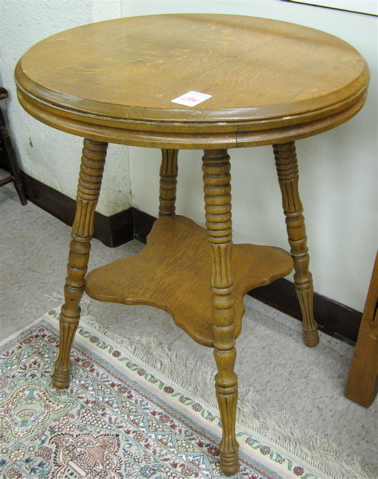 Appraisal: LATE VICTORIAN OAK LAMP TABLE American c having a round