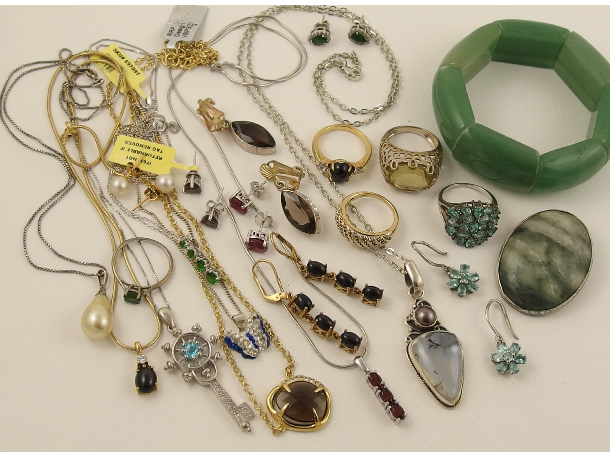 Appraisal: A collection of silver and costume jewellery to include rings