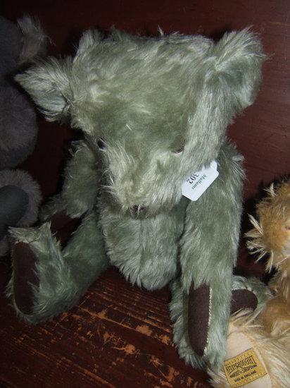 Appraisal: A pale green mohair teddy bear high