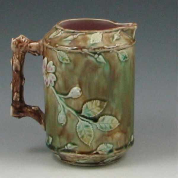 Appraisal: Majolica Mottled Floral Pitcher marked with small raised V two