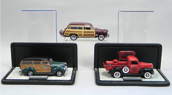 Appraisal: Franklin Mint Scale Displays Several th scaled vehicles encased in