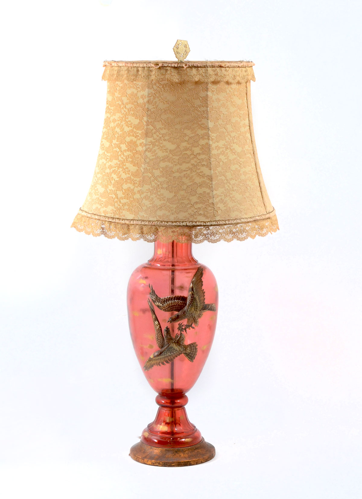 Appraisal: CRANBERRY GLASS LAMP WITH APPLIED EAGLES Surmounted by a pierced