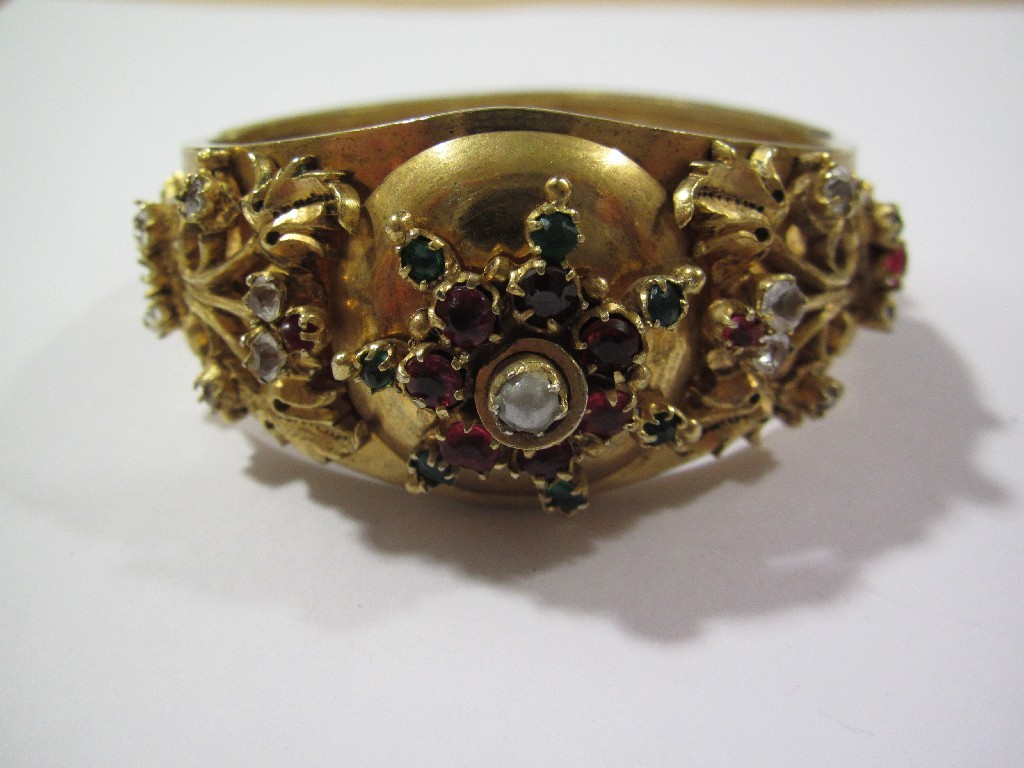 Appraisal: Gilt metal bangle with gem set star centre flanked by