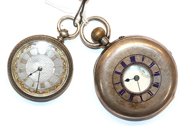 Appraisal: A SILVER CASED HALF HUNTER POCKET WATCH with white enamel