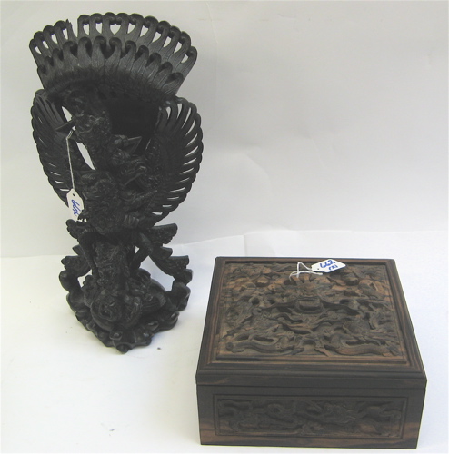 Appraisal: A SINO-TIBETAN EXOTIC HARD WOOD CARVING OF A DEITY AND