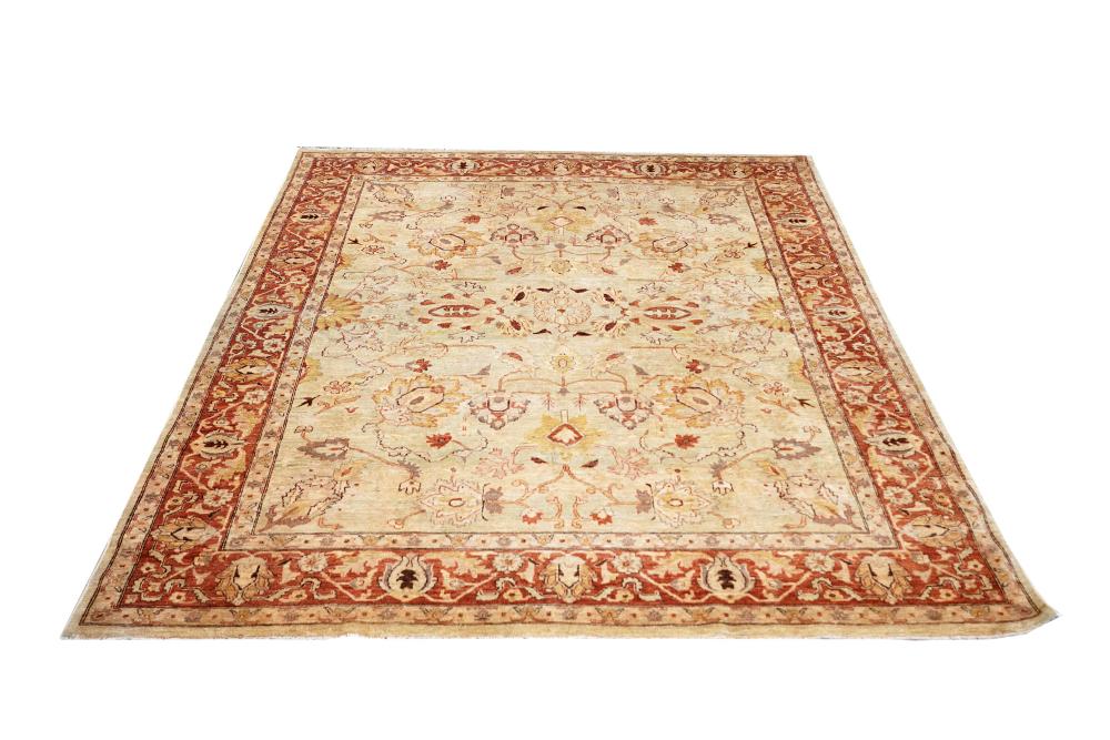 Appraisal: PAKISTANI BEIGE FIELD CARPETCondition good with even pile wear some