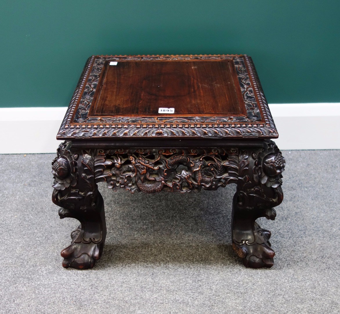 Appraisal: A late th century Chinese square hardwood urn stand the