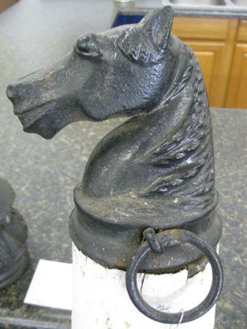 Appraisal: Pair of Figural Horsehead Hitching Posts cast iron one still