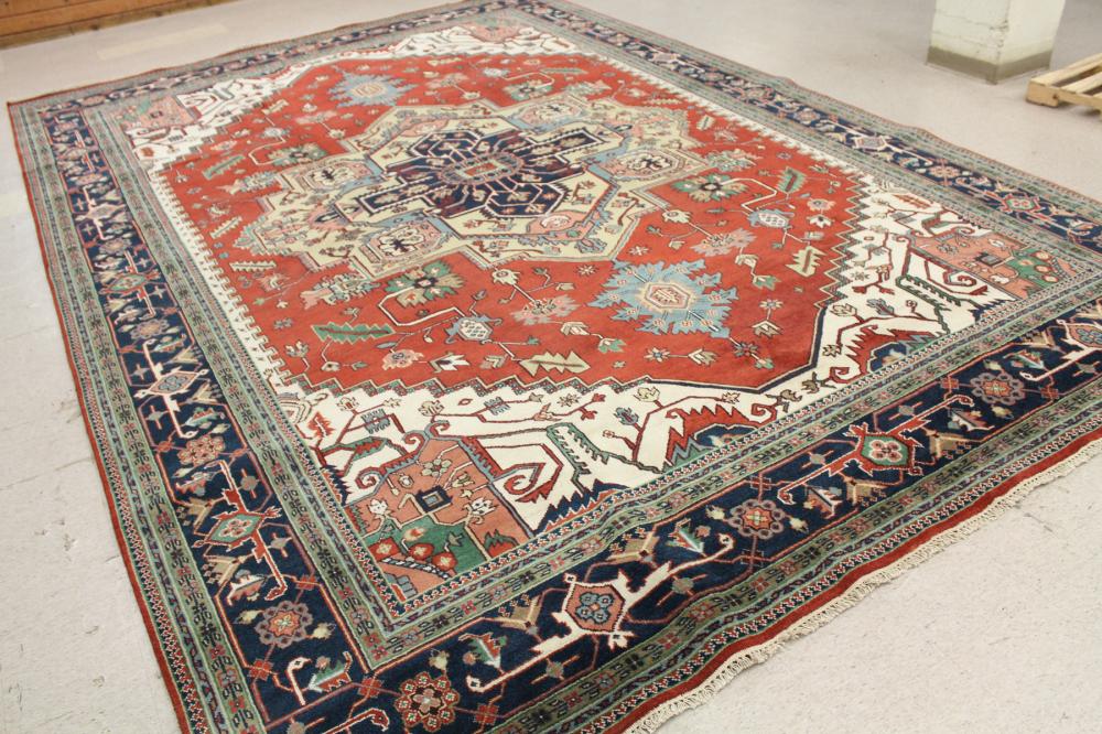 Appraisal: HAND KNOTTED ORIENTAL GRAND ROOM CARPET Persian Serapi design on