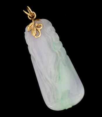 Appraisal: A Carved Lavender Jade Pendant k yellow gold mounting suspends