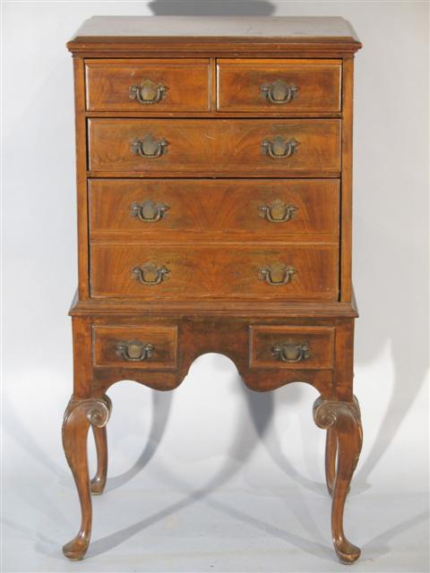 Appraisal: MINIATURE QUEEN ANNE STYLE CHEST ON STAND The rectangular top