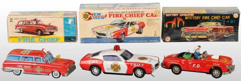 Appraisal: Lot of Tin Litho Fire Chief Toys Description Japanese Working