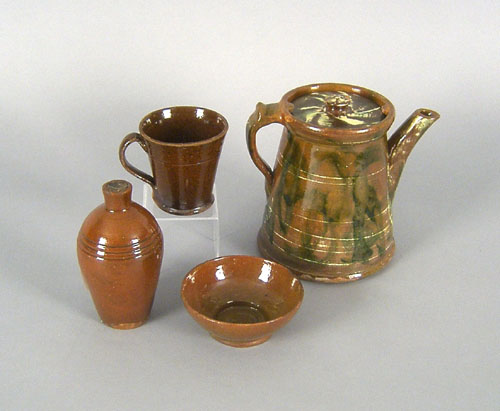 Appraisal: Redware coffee pot together with bowl jug and mug