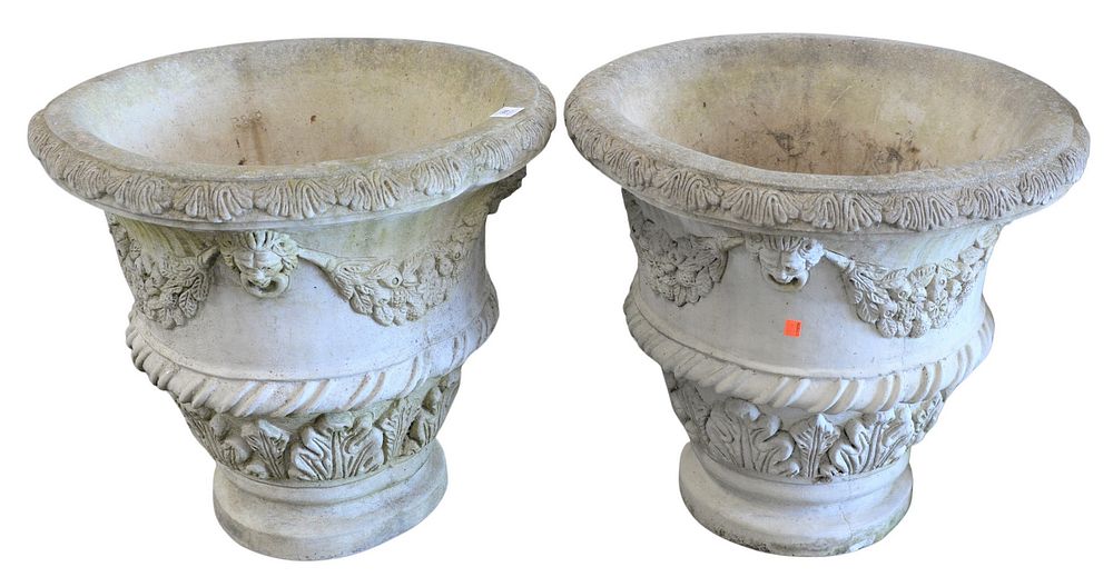 Appraisal: Pair of Concrete Urns having paces and swags signed Nina