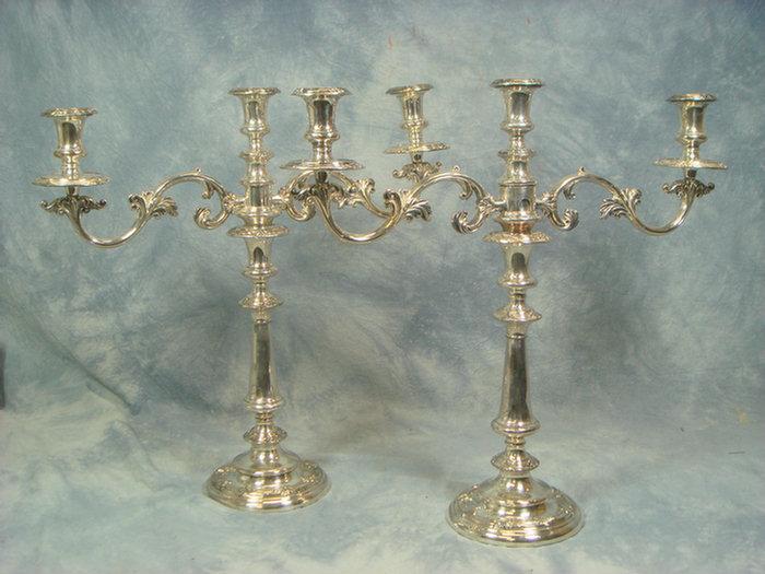 Appraisal: Pr weighted plated Sheffield silver convertible nozzle candelabra h Estimate