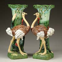 Appraisal: OUTSTANDING PAIR OF MAJOLICA OSTRICH PEDESTALS Each feature a standing