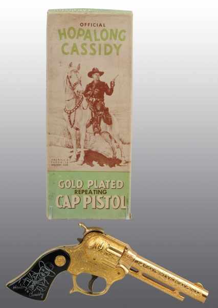 Appraisal: Gold Hopalong Cassidy Cap Gun in O B Description s