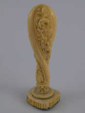 Appraisal: A finely carved th century ivory desk seal approx cm