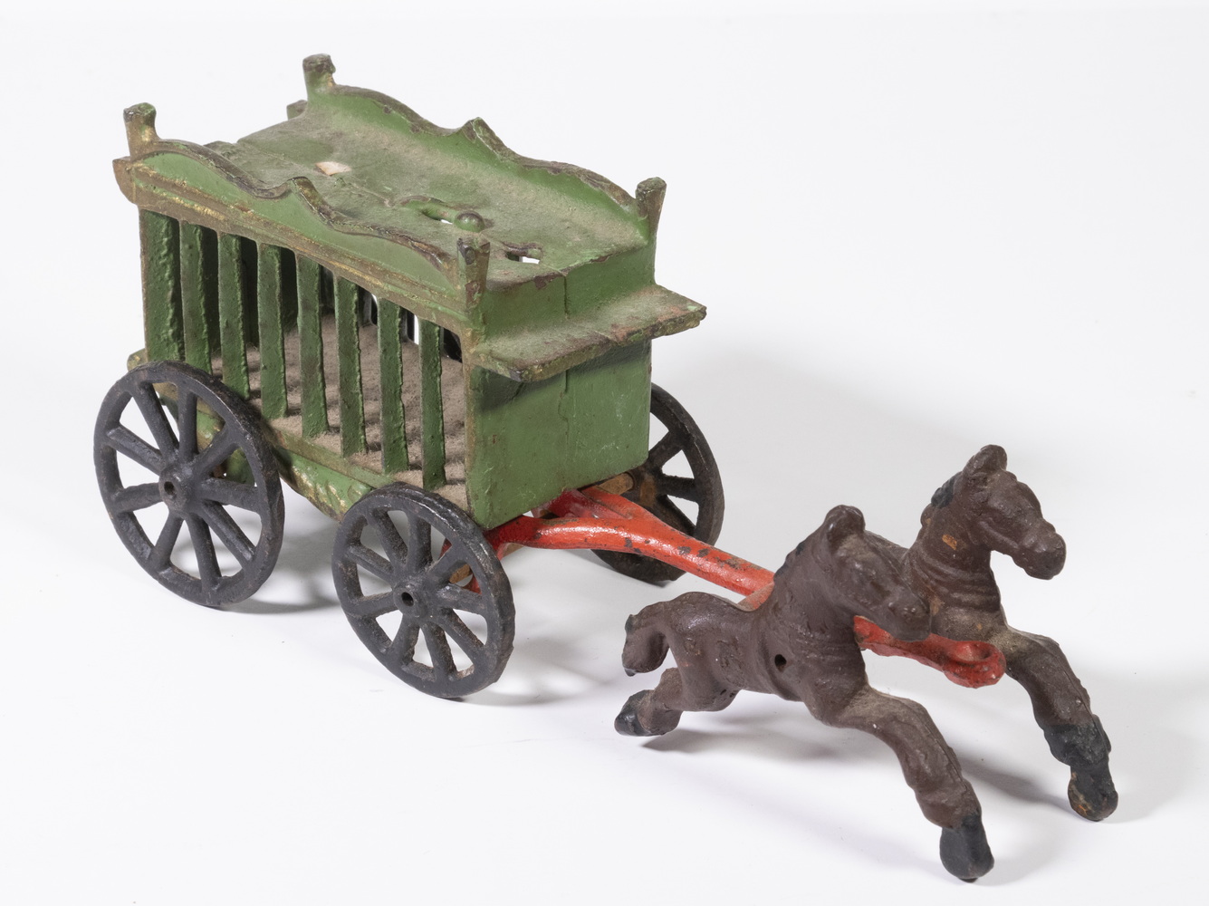 Appraisal: CAST IRON TOY CIRCUS WAGON Vintage Painted Iron Two-Piece Horse