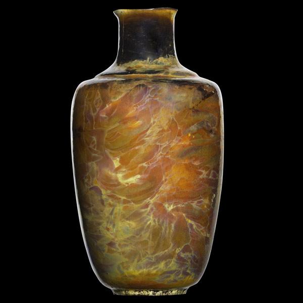 Appraisal: THEOPHILUS A BROUWERMIDDLELANEBaluster vase in lustered glazeA few nicks to