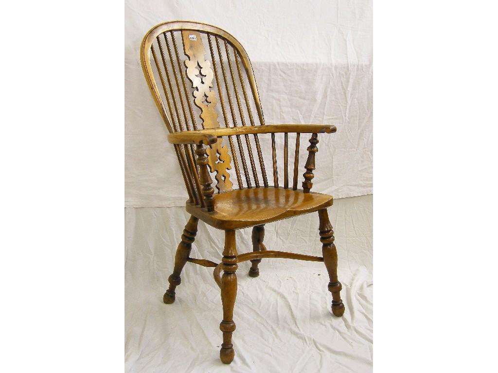 Appraisal: Windsor armchair the spindle back with pierced yew vase splat