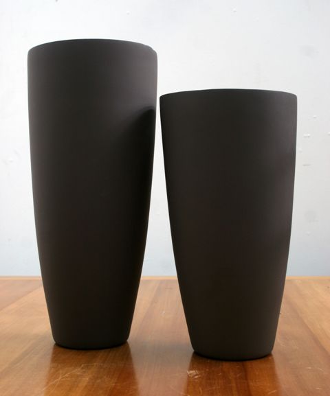 Appraisal: Two ceramic vases by Kose Milano in aubergine with white