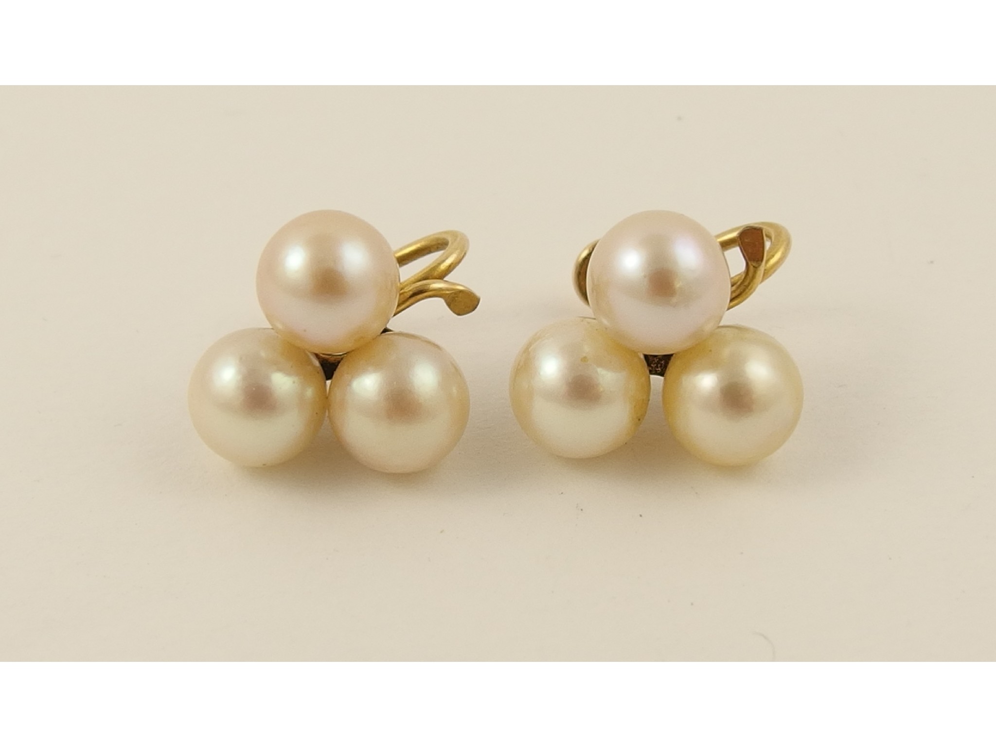 Appraisal: A pair of gold plated cultured pearl cluster earrings