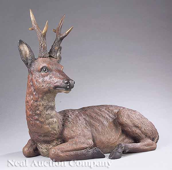 Appraisal: A Fine Czechoslovakian Glazed Terracotta Figure of a Recumbent Stag