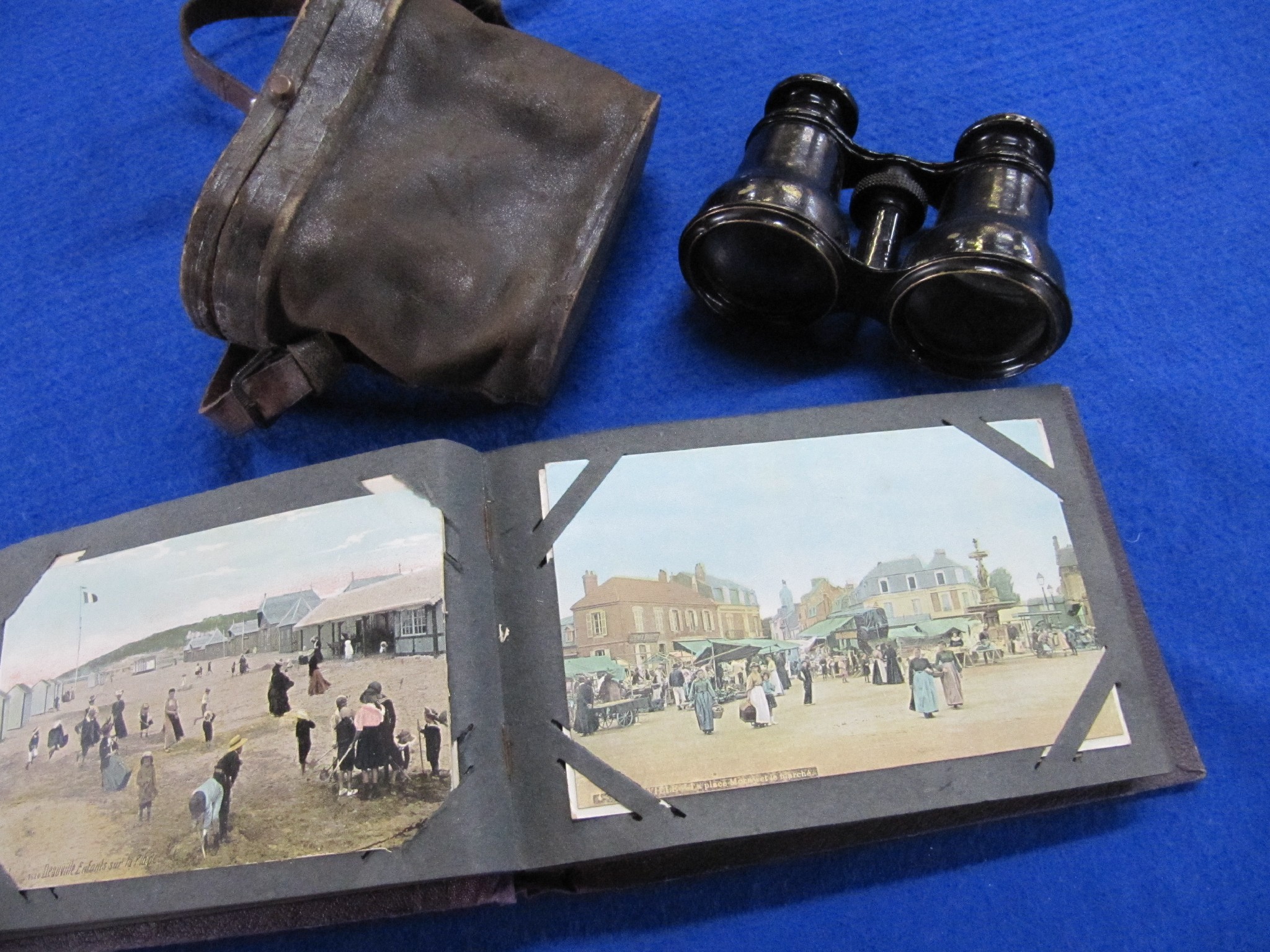 Appraisal: A lot comprising two pairs of binoculars postcards etc