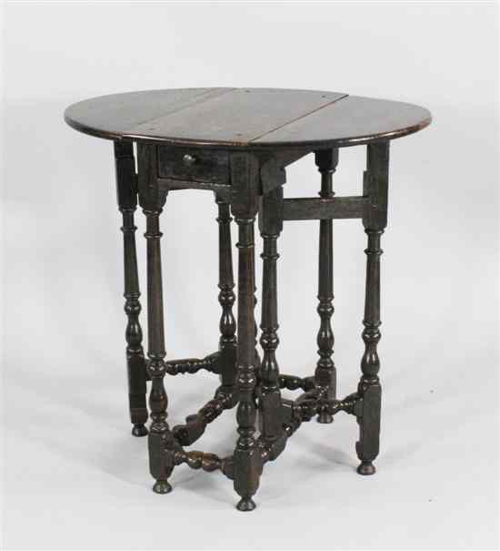 Appraisal: A William and Mary oak oval gateleg table c with