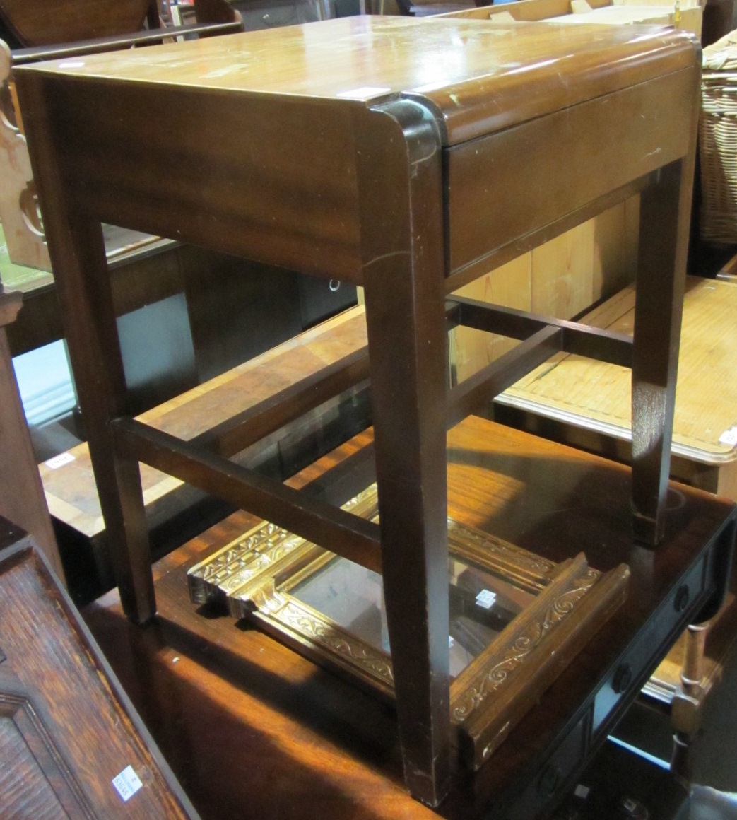 Appraisal: A walnut occasional table a gilt mirror and a cased