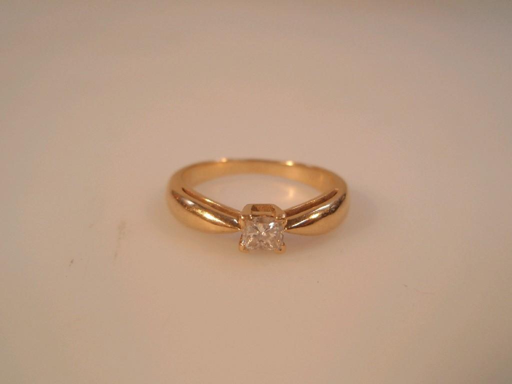 Appraisal: A solitaire diamond ring a princess cut stone of ct