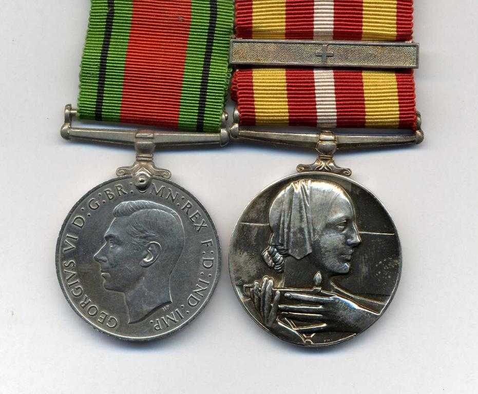 Appraisal: WORLD WAR TWO PAIR Defence Medal and Voluntary Medical Services