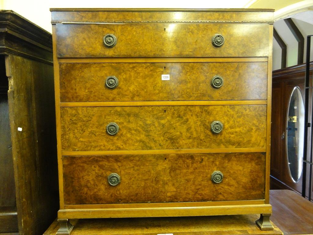 Appraisal: A Waring Gillow walnut chest fitted with four long graduated