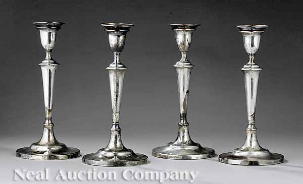 Appraisal: A Set of Four Georgian Sheffield Plate Candlesticks early th