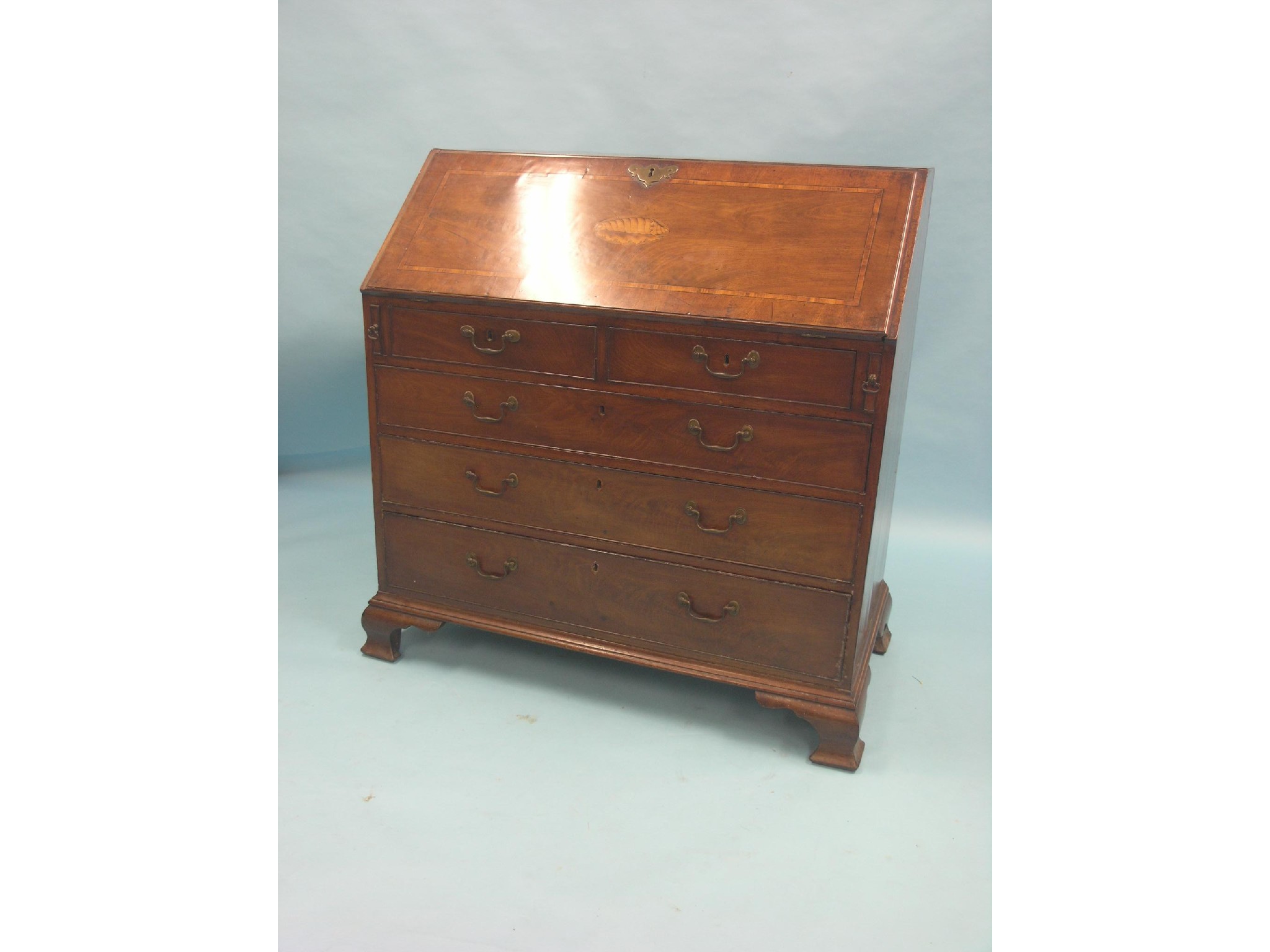 Appraisal: A George III mahogany bureau fall-front inlaid with conch shell