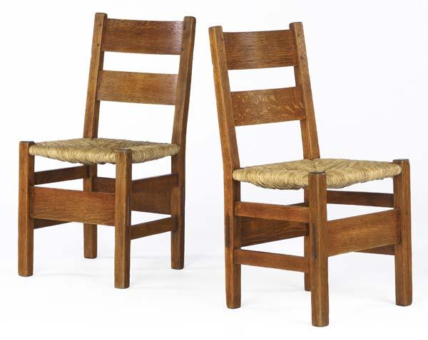 Appraisal: GUSTAV STICKLEY Pair of early Thornden ladderback chairs no with